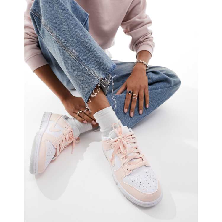 Pale pink nikes hotsell