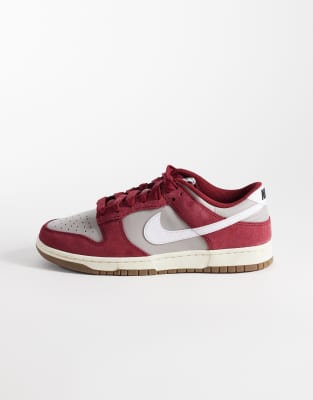 Nike Dunk Low Retro SE sneakers in gray and red