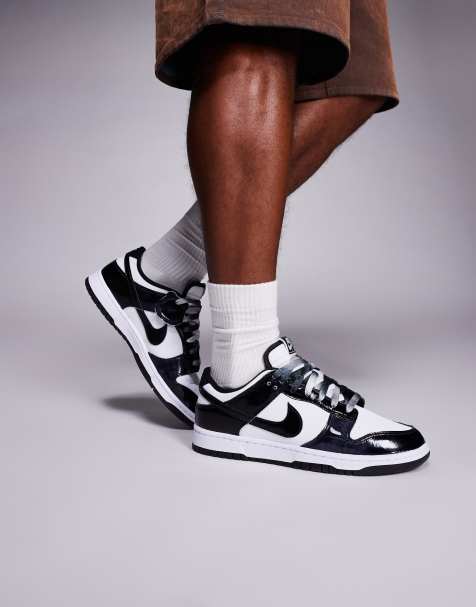 Nike Dunk Low Retro SE sneakers in white and black - view 1