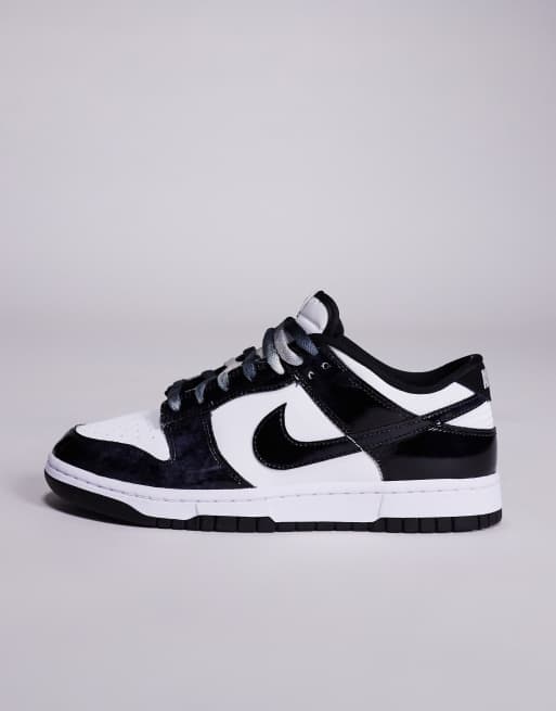 Nike Dunk Low Retro SE sneakers in white and black