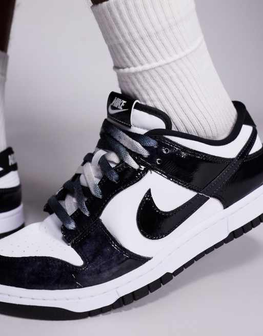 Nike Dunk Low Retro SE sneakers in white and black | ASOS