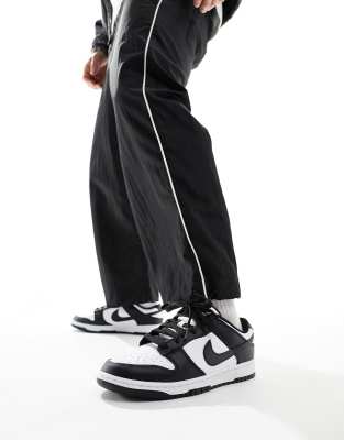 Nike Dunk Low Retro sneakers in black and white | ASOS