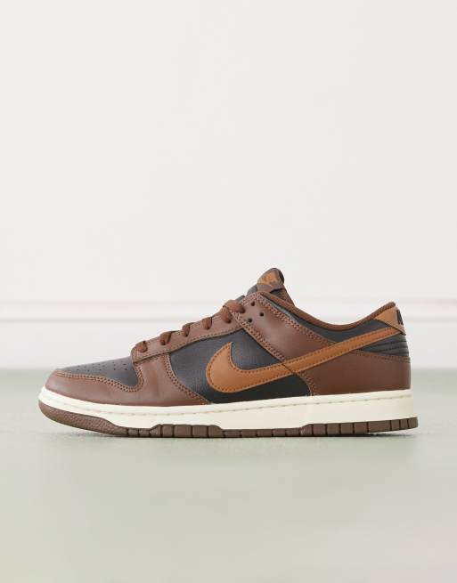 Nike Dunk Low retro sneakers in brown and black
