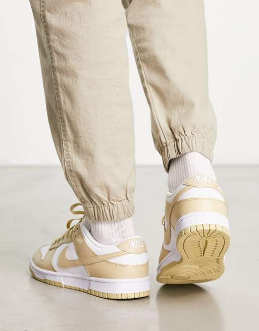 Nike Dunk Low Retro sneakers In gold and white | ASOS