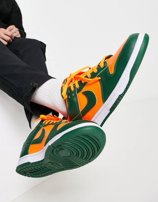 Nike Dunk Low Retro sneakers in green and orange