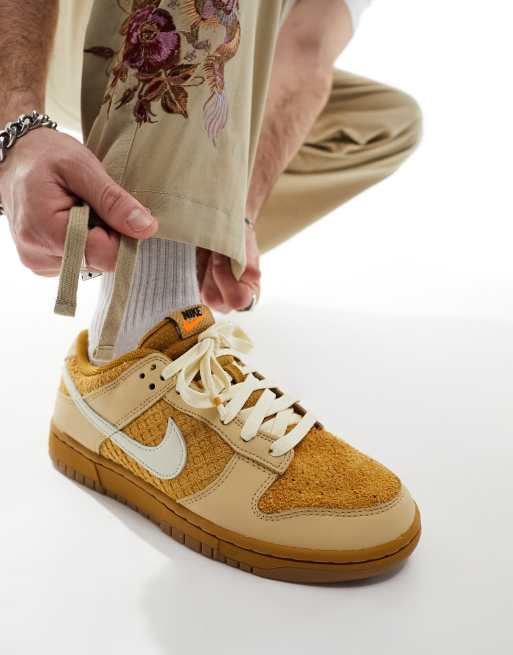 Nike Dunk Low Retro sneakers in off white and brown