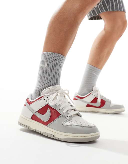 Nike Dunk Low Retro sneakers in off white and red