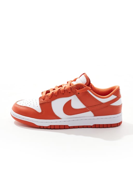 Nike Dunk Low Retro sneakers in white and orange | ASOS
