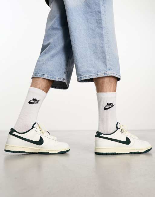 Nike Dunk Low sneakers in coconut milk and deep green ASOS