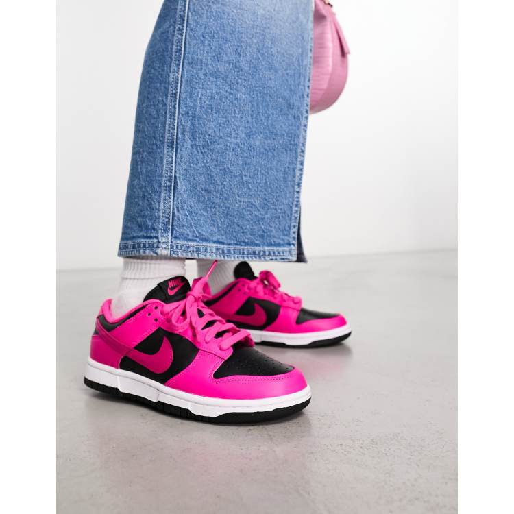 Nike Dunk Low sneakers in fierce pink and black | ASOS