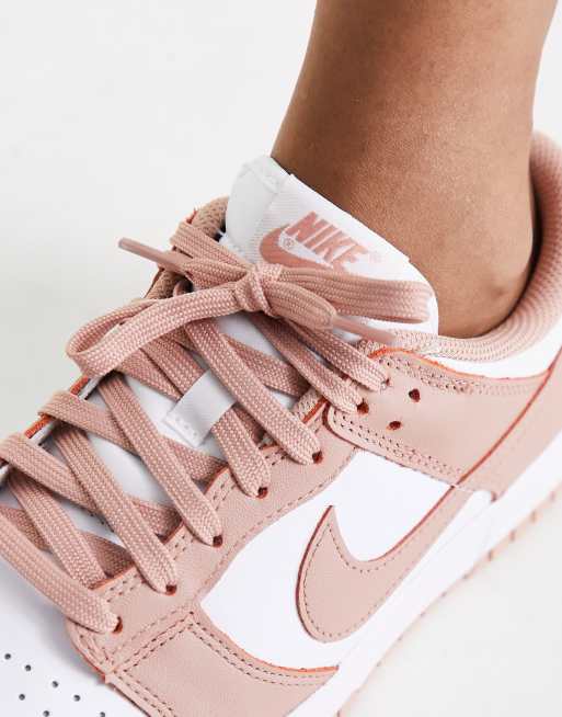 Light pink and store white nikes