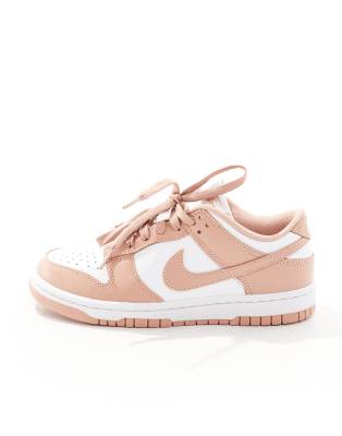Nike Dunk Low sneakers in white and pink