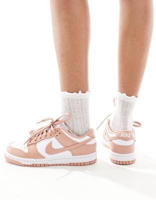 Nike Dunk Low sneakers in white and pink