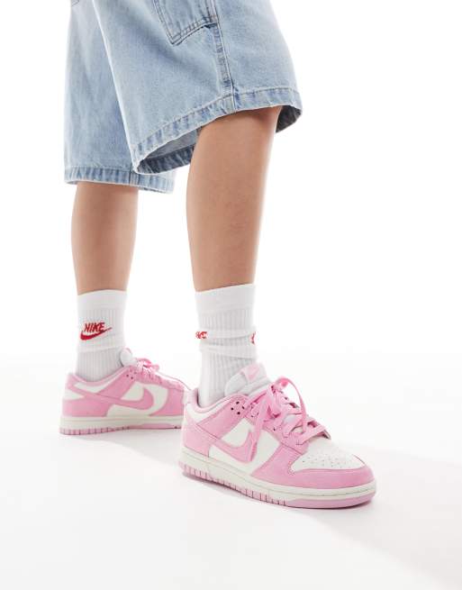 Nike Dunk Low sneakers in white and pink