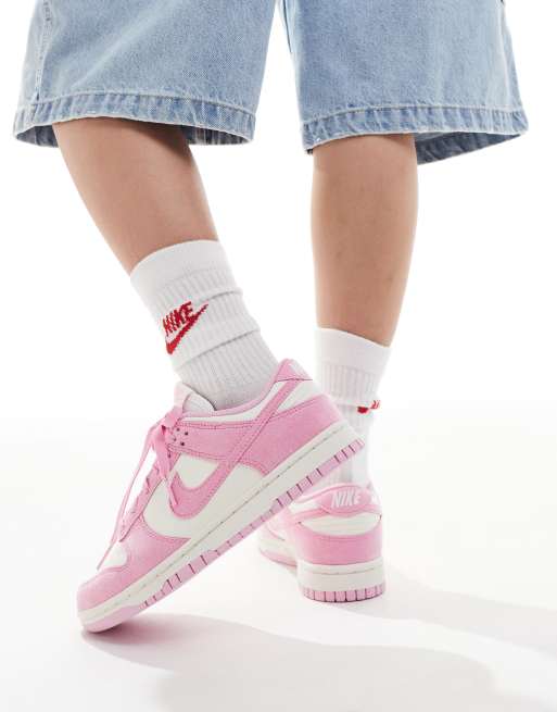 Nike Dunk Low sneakers in white and pink