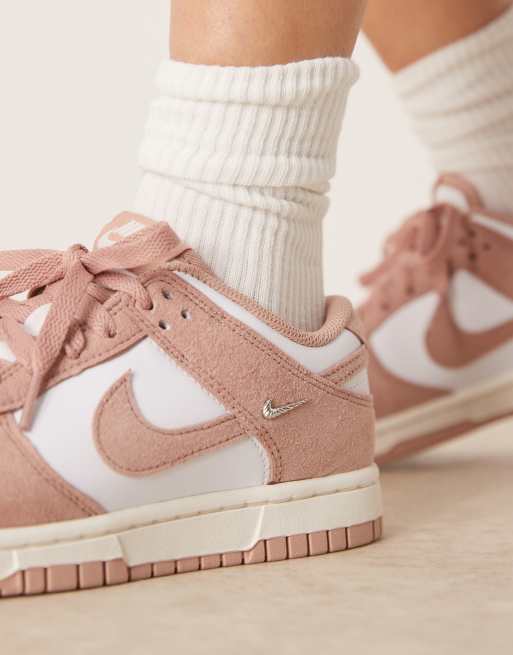 Nike Dunk Low sneakers in white & pink