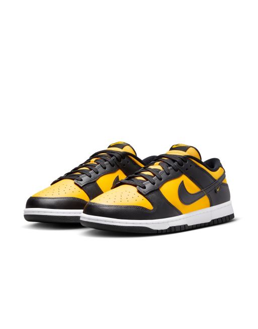 Nike Dunk Low sneakers in yellow and black