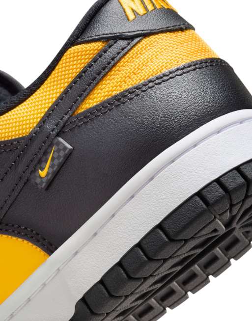 Nike Dunk Low sneakers in yellow and black