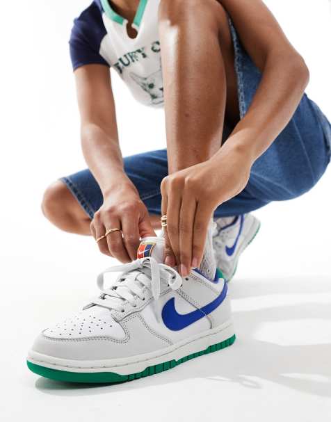 Nike Dunk Low trainer in white and blue detail - view 1