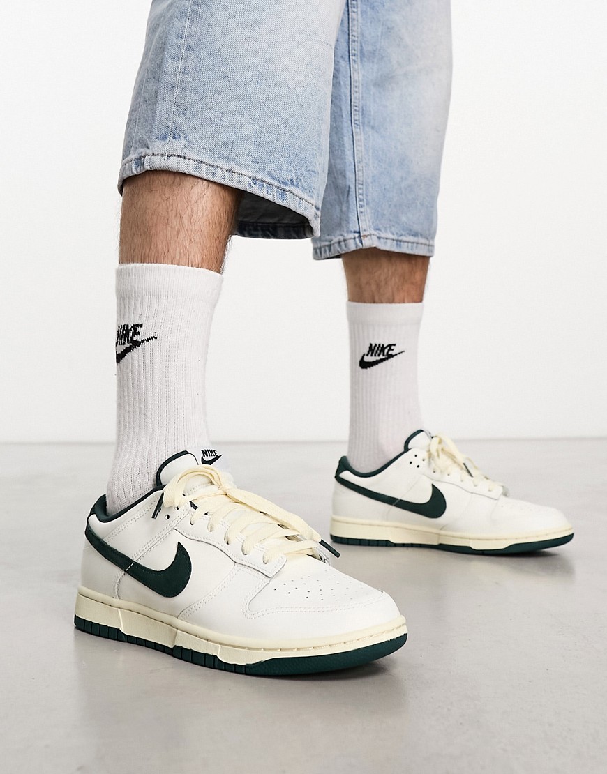 Nike Dunk Low trainers in coconut milk and deep green