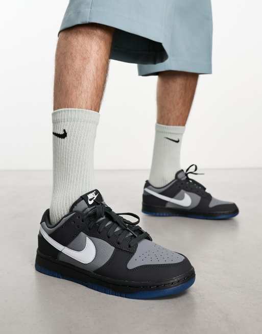 Nike Dunk Low trainers in grey and black