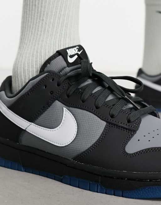 Nike Dunk Low trainers in grey and black