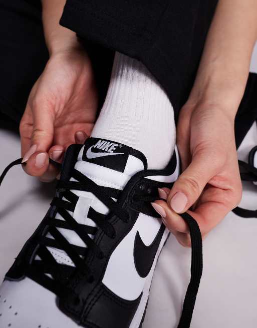 Nike Dunk Low trainers in white and black