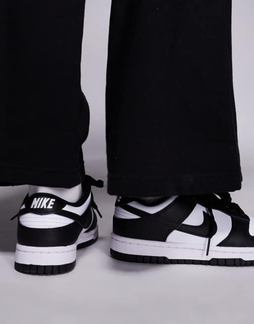 Nike Dunk Low unisex trainers in white and black , 4 of 5