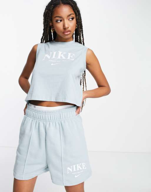 Nike Essential – Błękitne polarowe szorty w stylu retro ściągane na sznurek