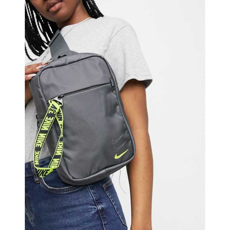 Nike essential cross body bag in grey and neon yellow with front