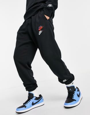 nike multi logo joggers
