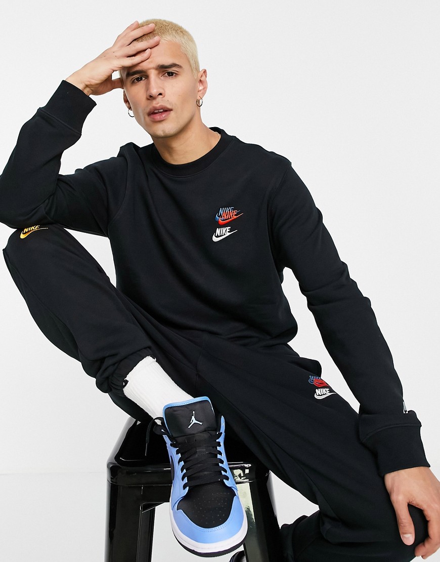 Nike Essential fleece+ multi logo crew neck sweatshirt in black