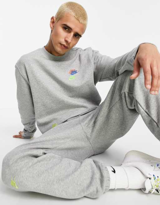 Nike Essential fleece multi logo crew neck sweatshirt in grey | ASOS