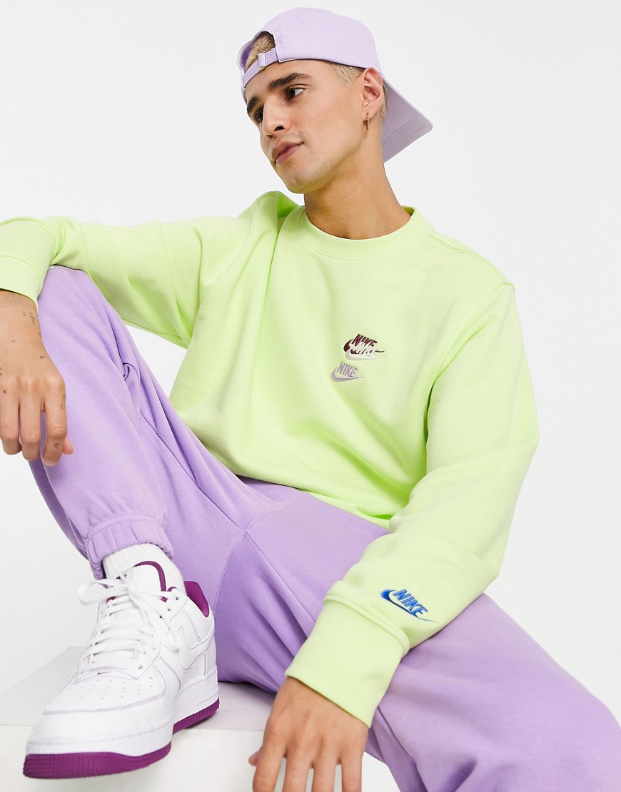 Nike Essential fleece+ multi logo crew neck sweatshirt in lemon-Yellow