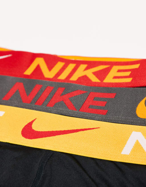 Nike Essential Microfiber 3-pack trunks in black with red/gray/yellow waistbands, 3 of 3