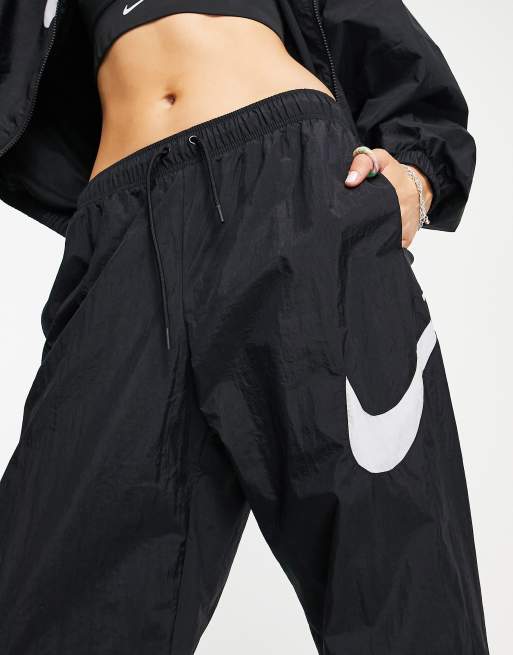 Buy Nike Sportswear Essential Woven Pants Black in UAE