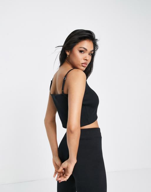 Nike Essential mini swoosh ribbed cropped cami in black