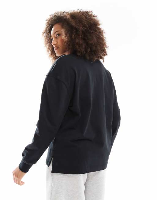 Nike Essential oversized long sleeve polo in black | ASOS