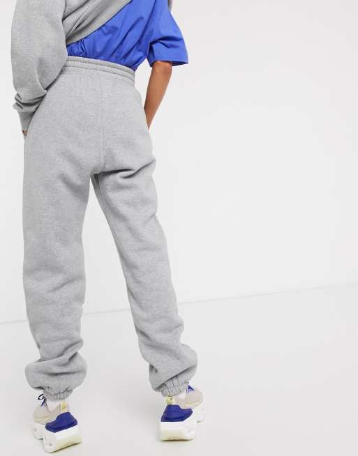 Nike mini Swoosh oversized joggers in grey, ASOS