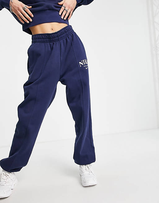 expeditie kleding Onvergetelijk Nike - Essential - Retro joggingbroek van fleece in donkerblauw | ASOS