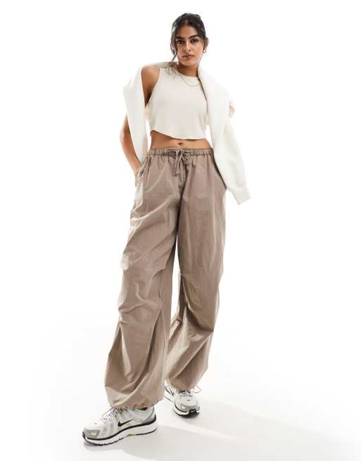 Nike Essential ribbed cropped tank top in beige, 3 of 4