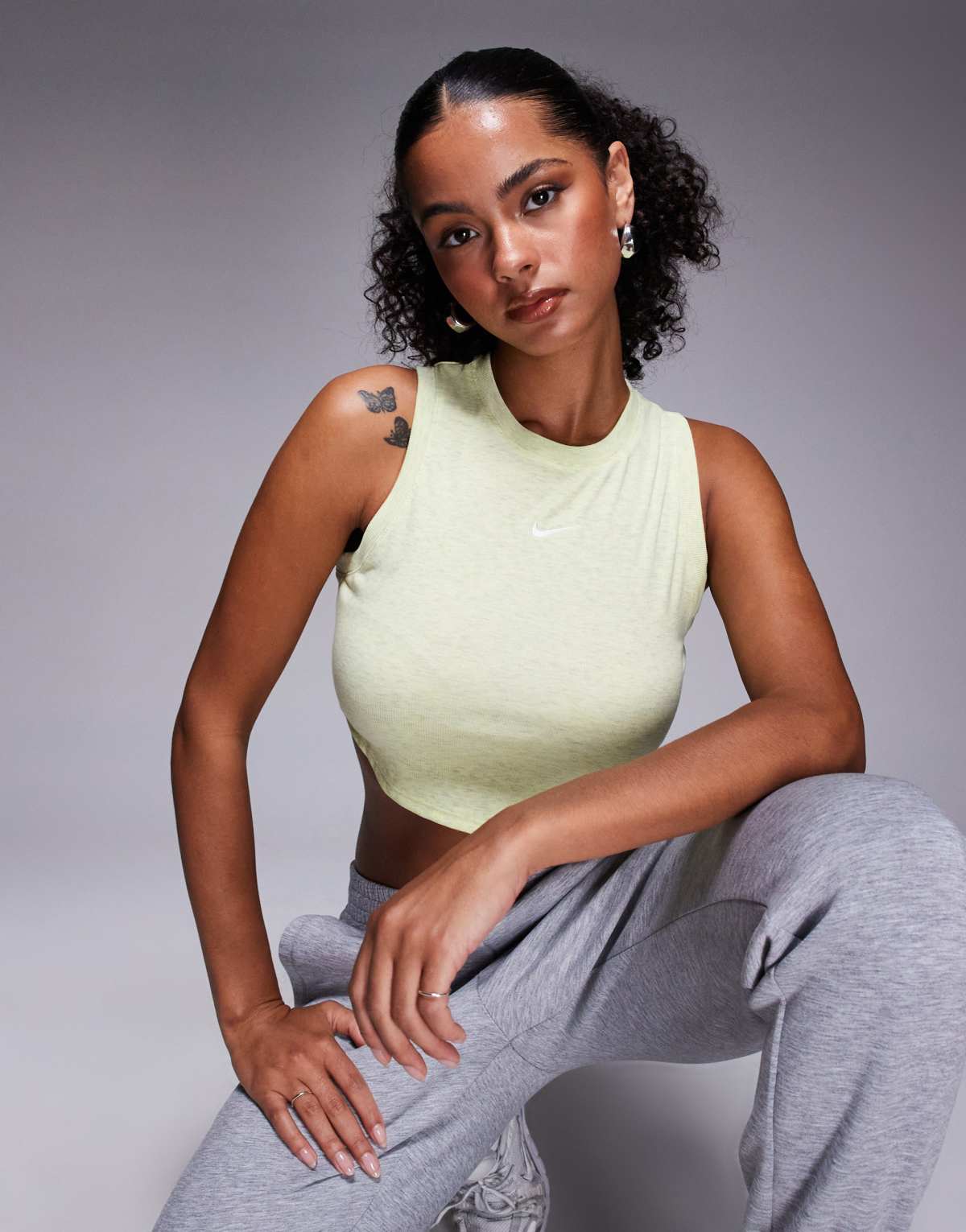 Nike Essential ribbed cropped vest in lime green