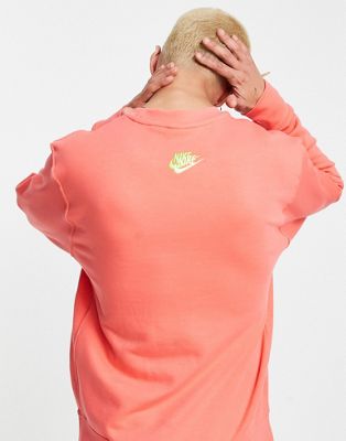 Sweats et sweats à capuche Nike - Essential - Sweat ras de cou en polaire avec logos multiples - Corail