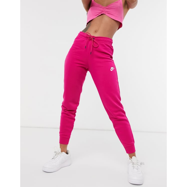 Nike essential tight fit fleece joggers in dark pink ASOS