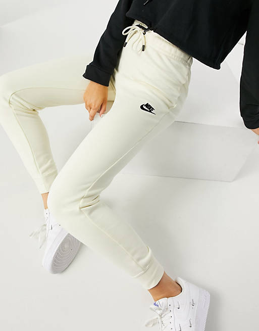 Nike essential tight fit fleece joggers in off white