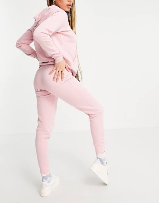 Nike essential tight fit fleece joggers in pink glaze