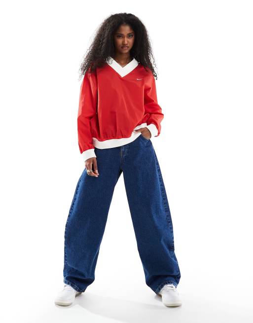 Nike Essential woven v-neck sweatshirt in red