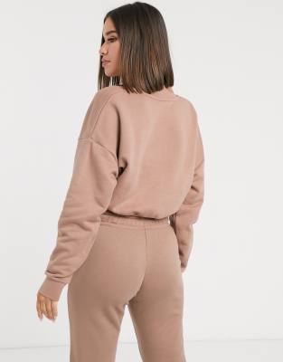 nike essentials beige cropped high neck sweatshirt