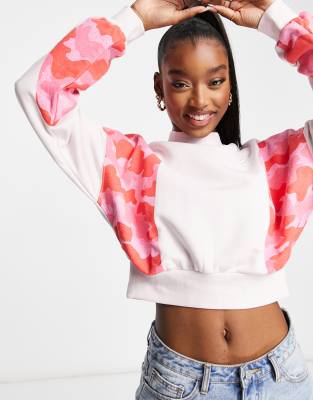 nike essentials pink cropped high neck sweatshirt