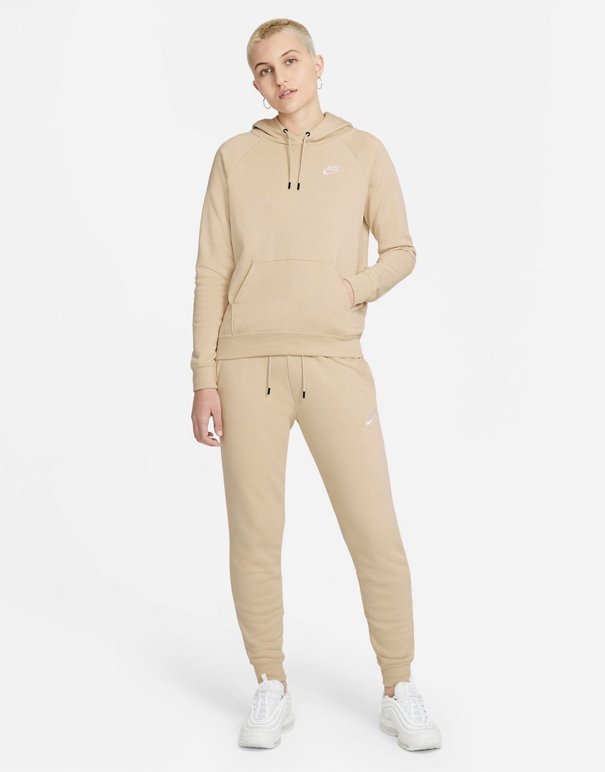 Nike Essentials Fleece regular fit cuffed sweatpants in sand-Neutral